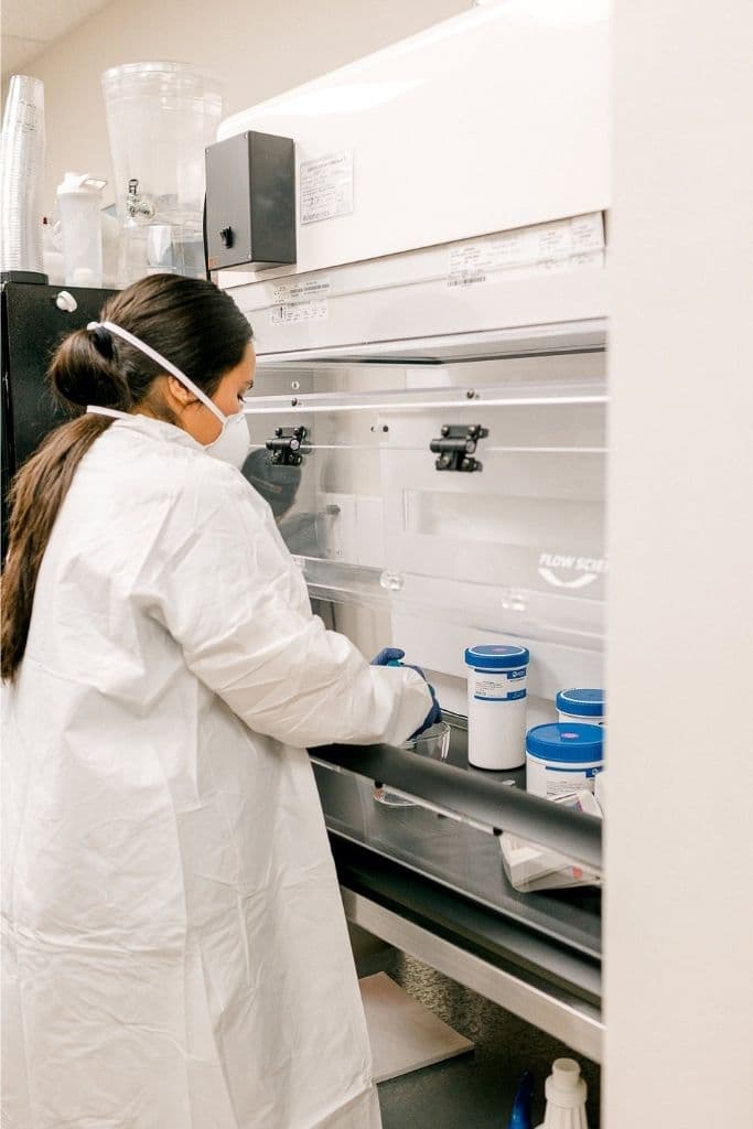 Expert pharmacy staff compounding hormone replacement therapy medication